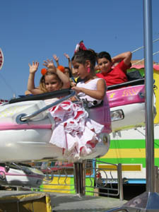 Children on the fair ground in Sanlucar de Barrameda